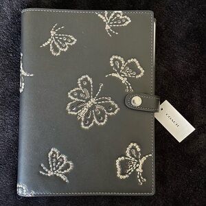 Sold Coach Butterfly notebook cover